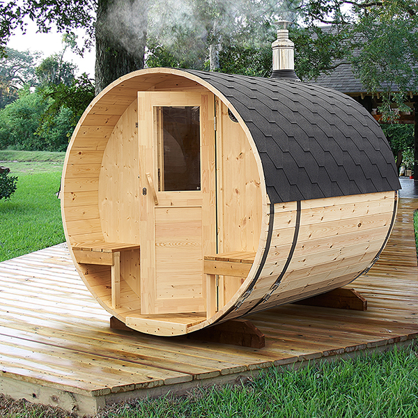 VIRU 2.4m barrel sauna on a wood deck, smoke rising from the chimney, terrace seats at the entrance
