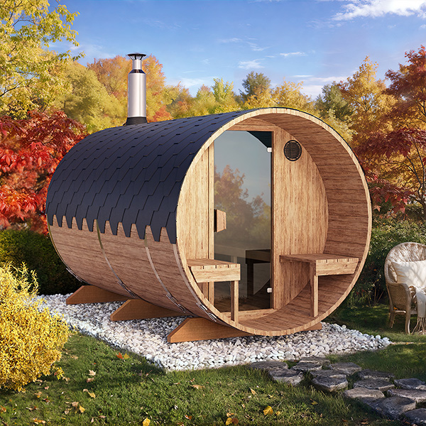 VIRU 3.6m barrel sauna in an autumn garden, glass front and terrace seats visible